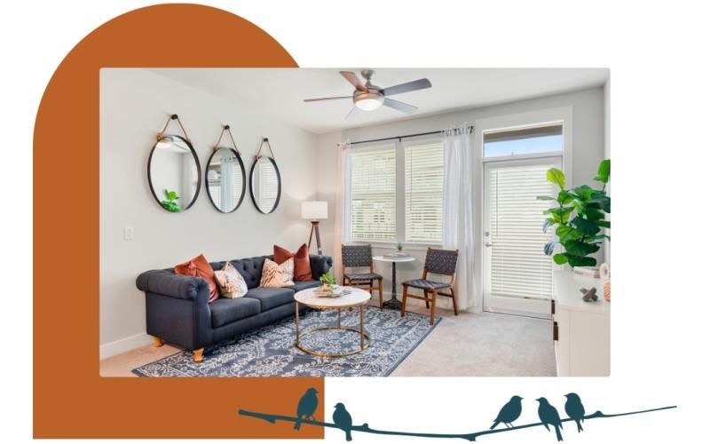 a living room with a couch and a table