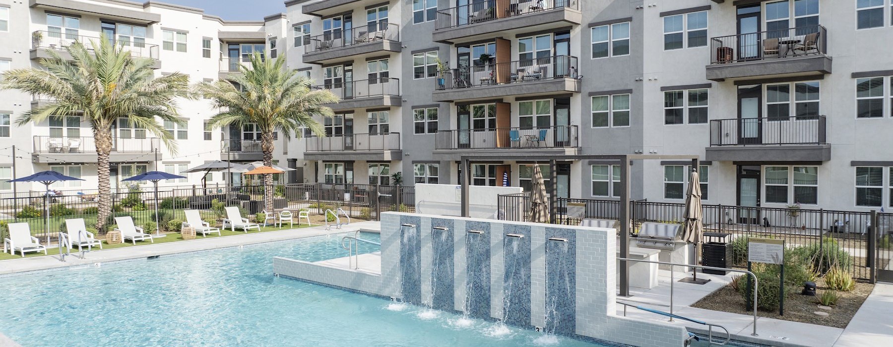 a pool in front of a building